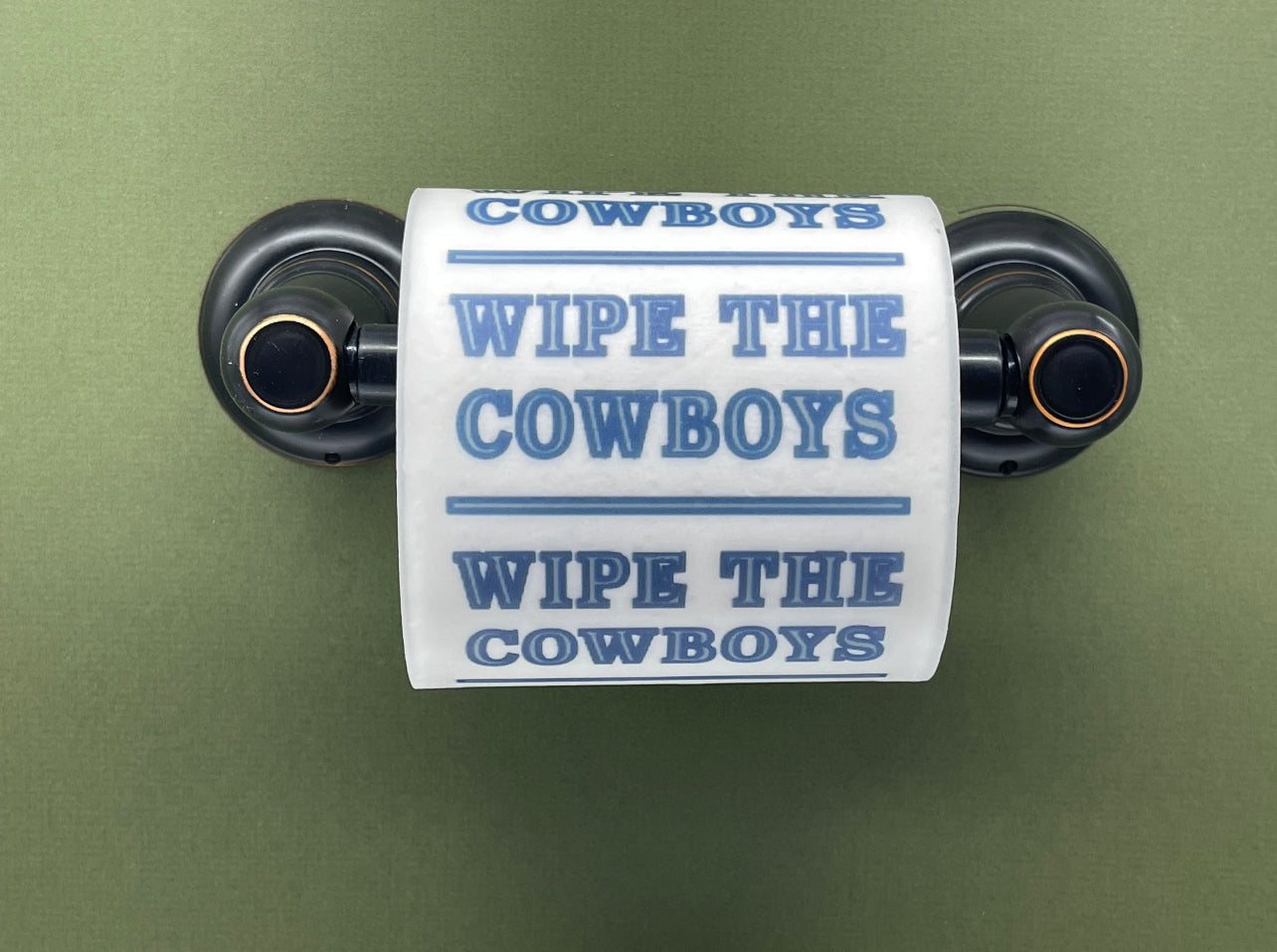 4 individually-wrapped “WIPE THE COWBOYS” toilet paper.