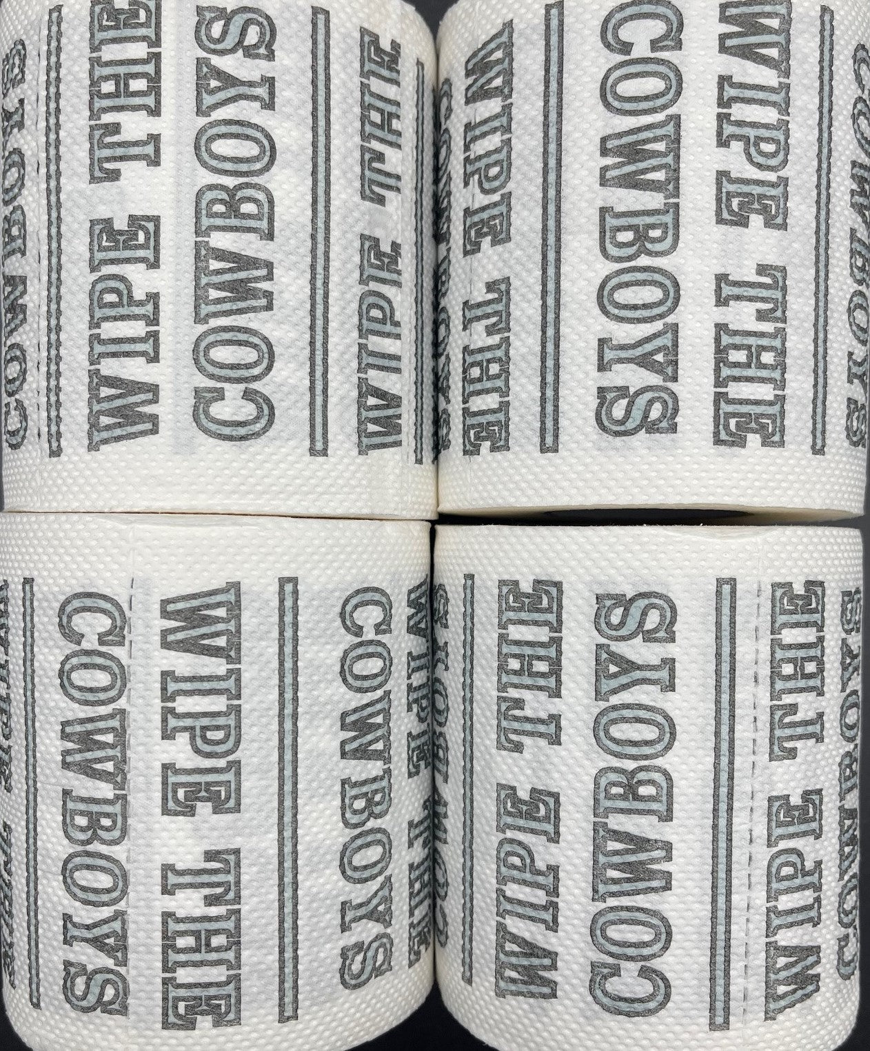 4 individually-wrapped “WIPE THE  COWBOYS” toilet paper.