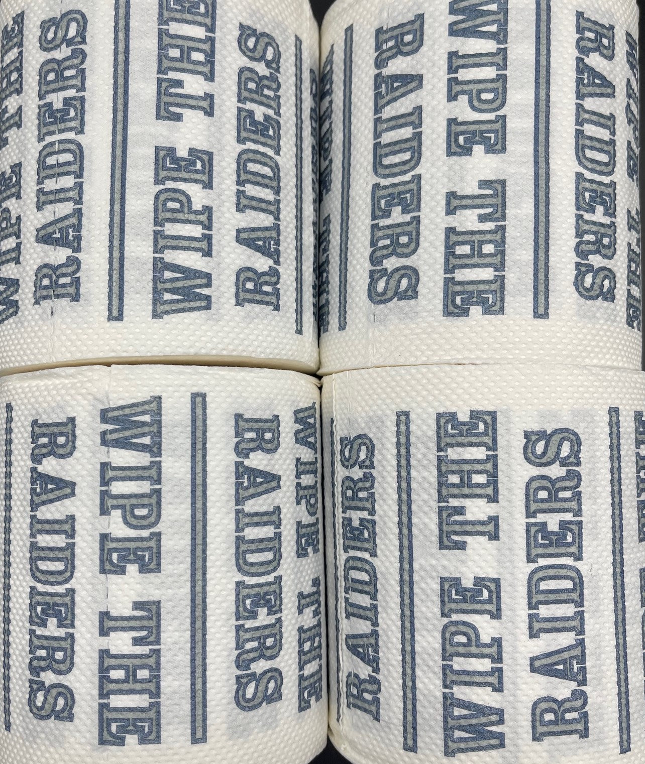 4 individually-wrapped “WIPE THE  RAIDERS” toilet paper.