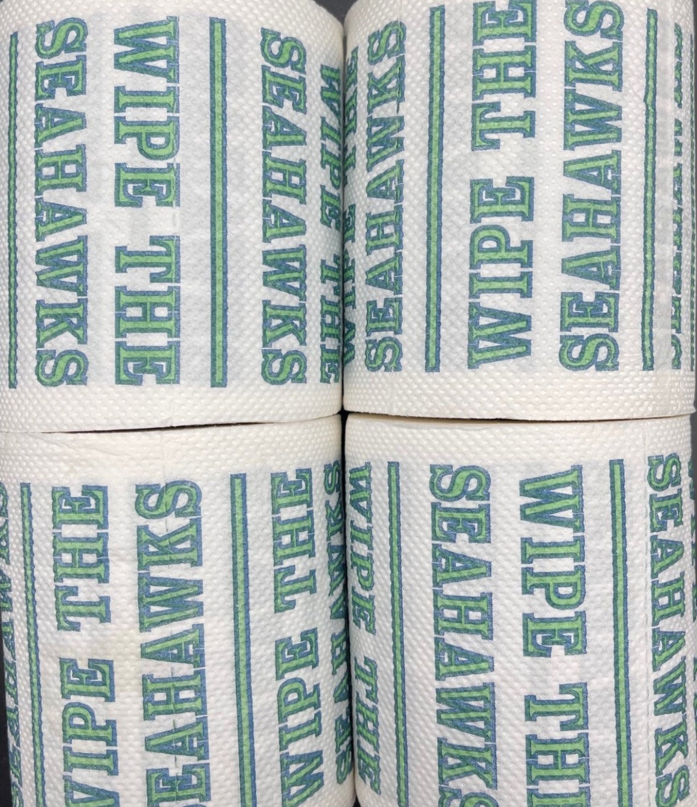 4 individually-wrapped “WIPE THE  SEAHAWKS” toilet paper.
