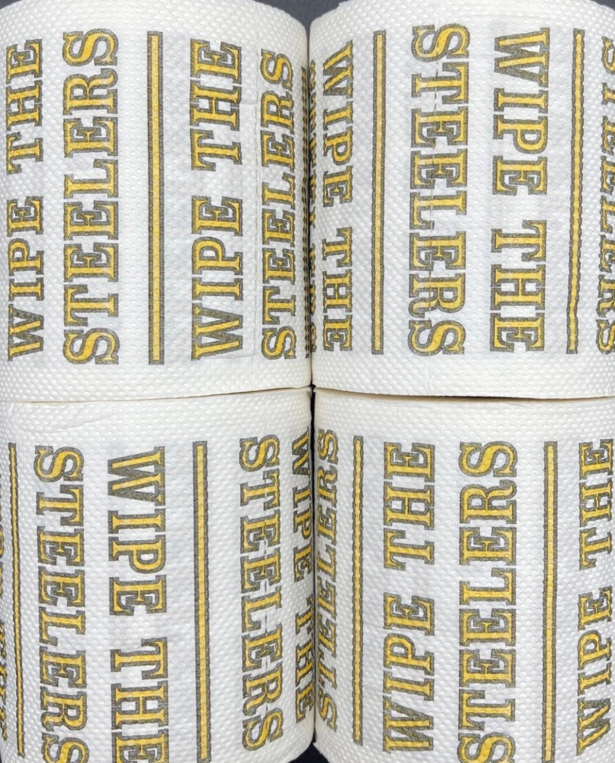 4 individually-wrapped “WIPE THE  STEELERS” toilet paper.
