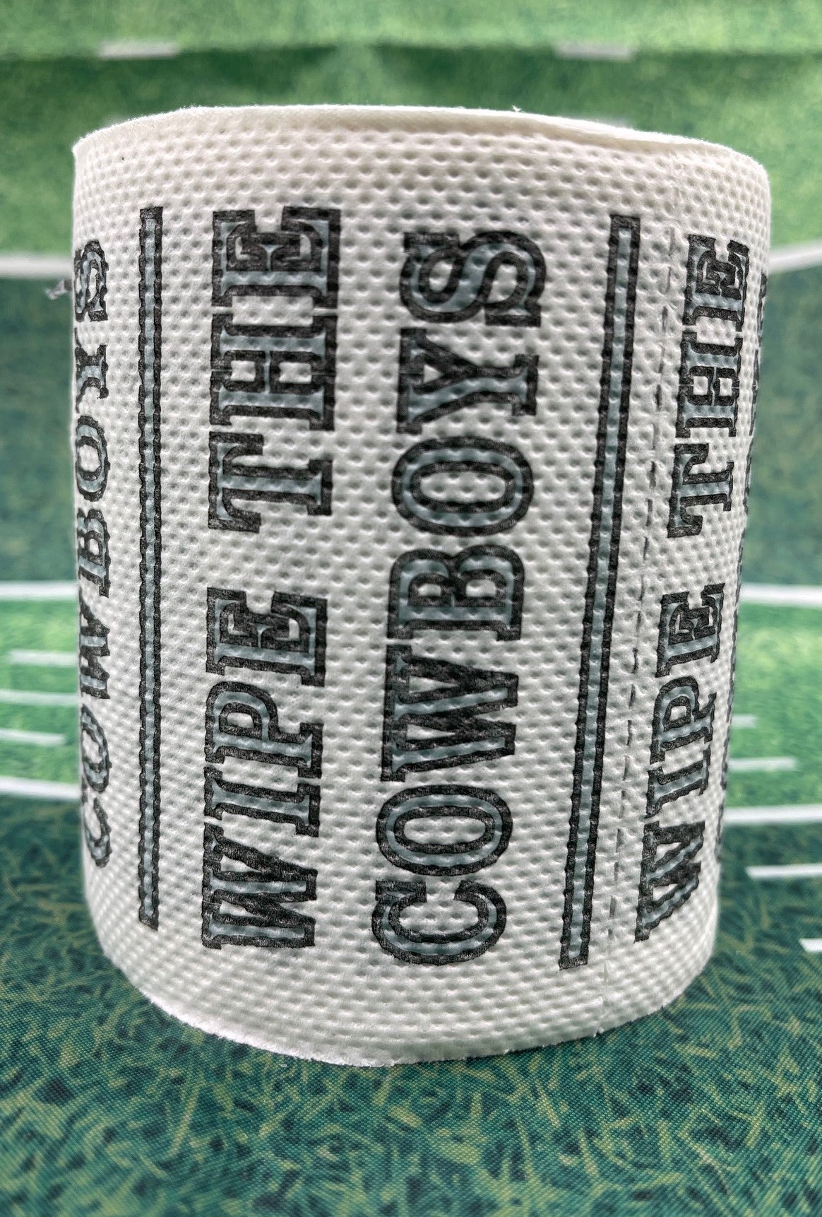 25 individually-wrapped “WIPE THE  COWBOYS” toilet paper.