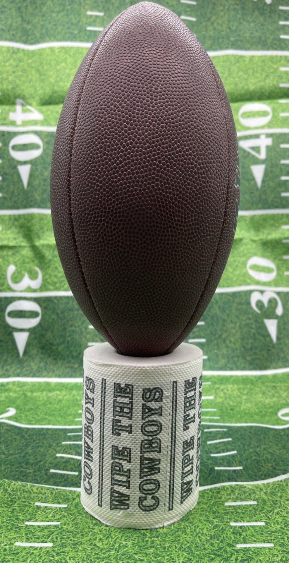 25 individually-wrapped “WIPE THE  COWBOYS” toilet paper.