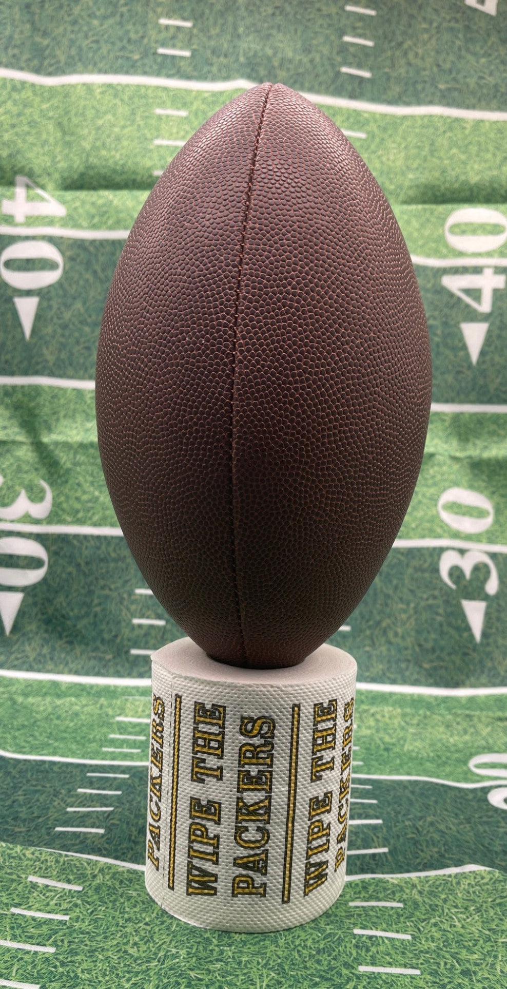 25 individually-wrapped “WIPE THE PACKERS” toilet paper.