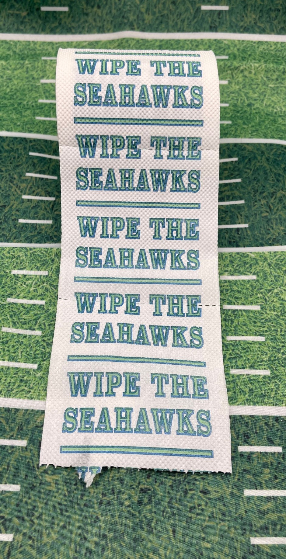 25 individually-wrapped “WIPE THE  SEAHAWKS” toilet paper.
